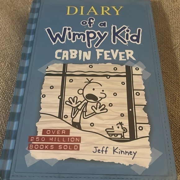 New diary of a wimpy kid bolume14 by Jeff Kinney title Cabin Fever - Picture 5 of 6